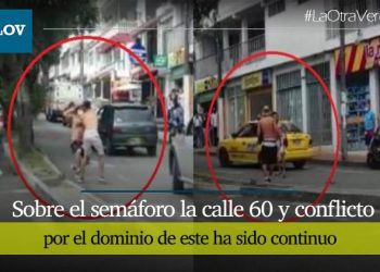 Limpia vidrios de la 60 se disputan el semƔforo
